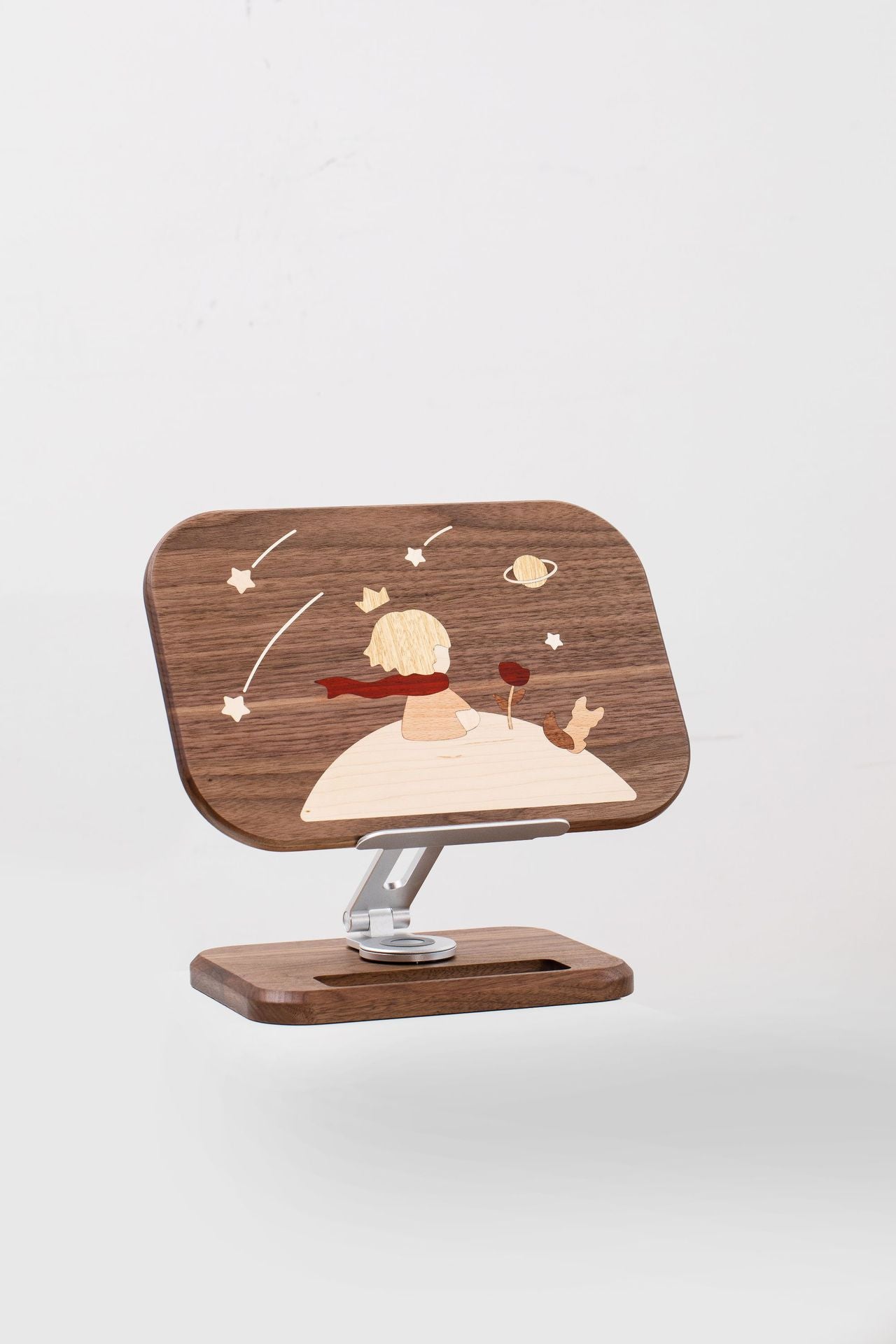 The Little Prince reading stand is made of solid wood and can be raised, lowered and extended