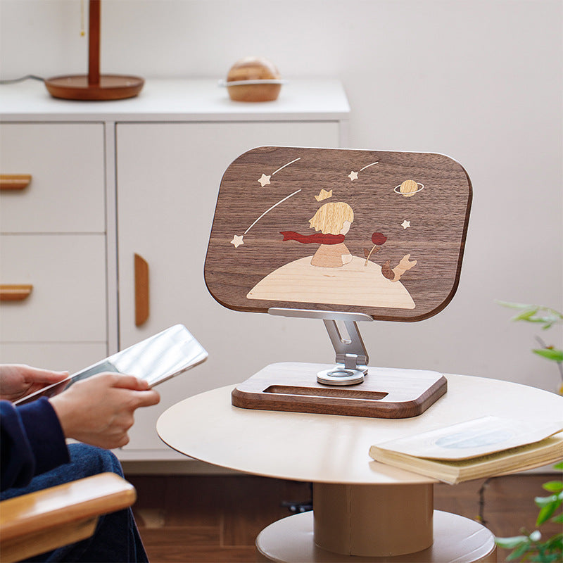 The Little Prince reading stand is made of solid wood and can be raised, lowered and extended