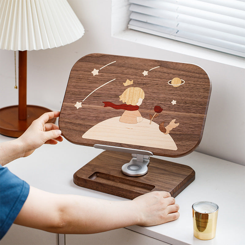 The Little Prince reading stand is made of solid wood and can be raised, lowered and extended